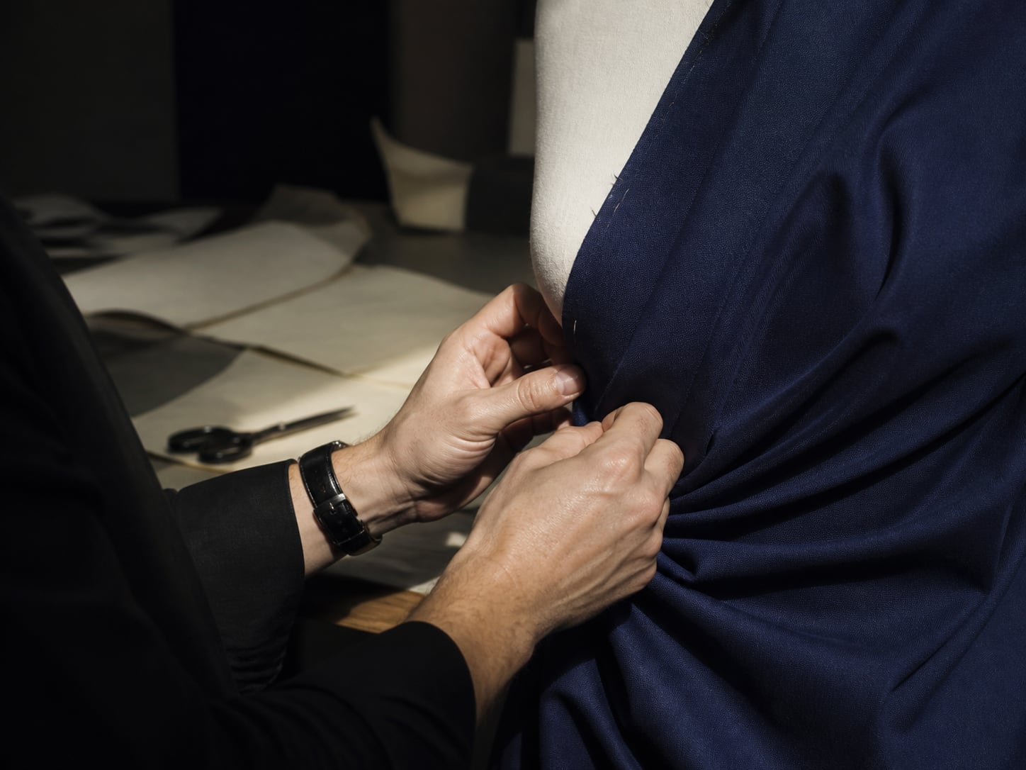 Fashion atelier fitting deep blue fabric